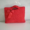 Bolso hecho a mano tricotando